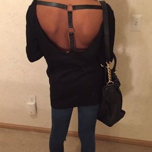 Black sweater leather straps in back